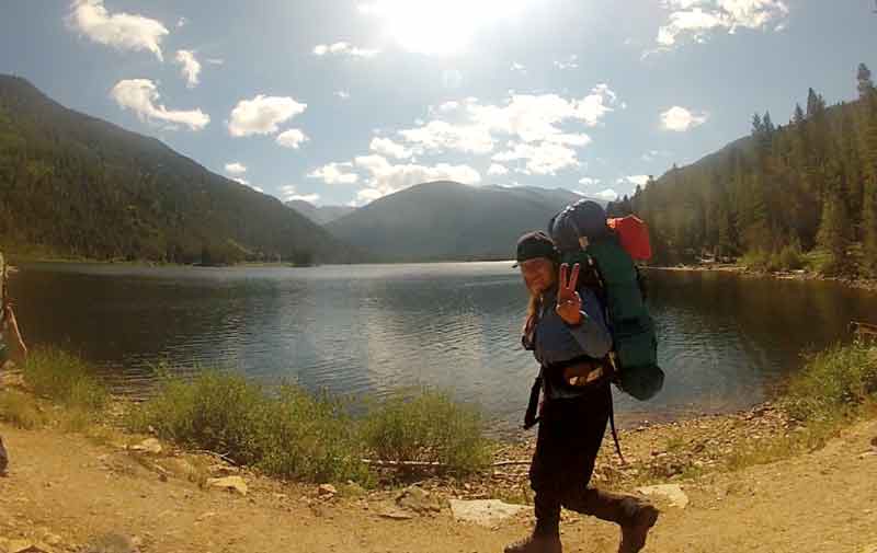 Judy B. Wagnon Bio Photo Hiking by a lake